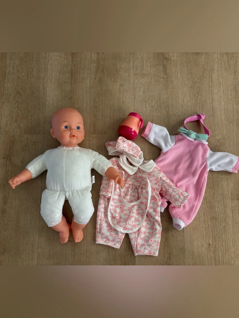 Soft Baby Doll with clothes bottle